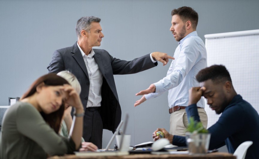 employee standing up against bullies